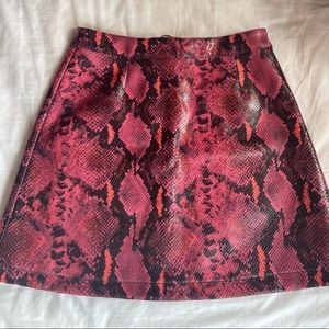 Snakeskin print leather skirt